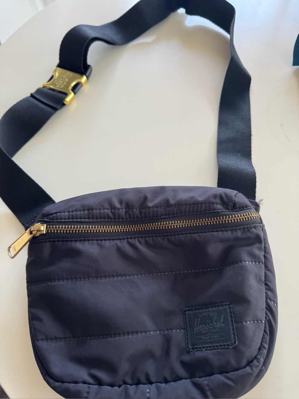 Herschel Supply Company unisex Black Quilted Crossbody Bag with Gold Hardware